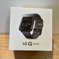White retail box of LG G Watch with image of the watch on front and LG G Watch branding.