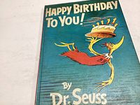 Cover photo showing the title Happy Birthday To You with a Dr. Seuss character holding a cake.