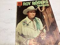 Front cover showing Roy Rogers in fringe western attire and cowboy hat, holding a rifle.