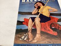 Front cover showing woman on red garden tiller with Coca-Cola bottle.