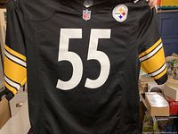 Front view of Pittsburgh Steelers #55 Bush jersey in large size, showing NFL and team patches and yellow stripes on sleeves.
