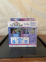 Front view of sealed Tulip One-Step Ice Dye Kit box showing product colors and key features