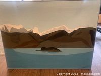 Landscape painting of mountains, water, and small island, signed N.E.W.