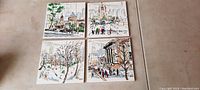 Four vintage painted ceramic tiles laid out showing diverse city scenes, artist signed 'RIO' in lower right corner of each.