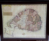 Front view of framed antique map of Ceylon with visible coloring and details.