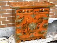 Front view showing two top drawers over double doors