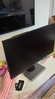 Front angle view of Acer monitor showing screen and partial stand.