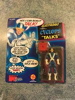 Front view of the sealed Cyclops talking action figure by ToyBiz with packaging showing Marvel X-Men branding.