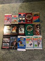 Full lot of 15 sealed retro hockey card packs laid out in rows on a carpet.