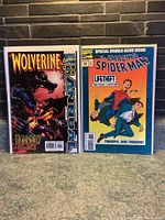 Front cover view of Wolverine Annual 1997 and Amazing Spider-Man 388 comic books side by side.