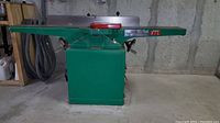 Full view of green jointer on concrete floor