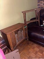 Small wooden side table with shelf underneath, medium brown finish, simple design