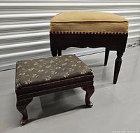 Two antique footstools positioned on the floor showing front and side view.