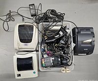 Full view of all lot contents including printers, credit card machine, scanner and cables