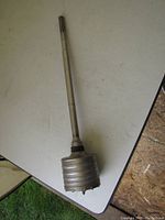 Top-down view of the Bosch concrete core bit showing the full 22-inch shaft and 4-inch diameter drill head.