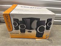 Box with product image and branding indicating Creative Inspire M4500 4.1 speaker system