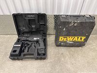Closed view of the Dewalt hard carrying case with yellow branding on black plastic.