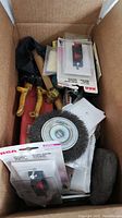 Box with assorted small hardware including wire brush wheel, small files and miscellaneous items