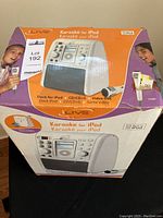 Box with product image showing iLive Karaoke Machine for iPod, highlighting dock for iPod, CD/CD+G, and video output features.