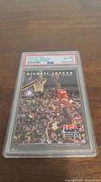 Close-up photo of 1992 Skybox Michael Jordan basketball card #38 in PSA protective case with grade 6 label visible