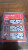 Front view of the facsimile autograph card showing the signatures and images of Wayne Gretzky, Mario Lemieux, and Sidney Crosby inside a plastic protective case.