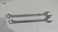 Photo showing two silver Craftsman wrenches side by side, sizes visible on wrench jaws.