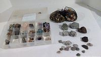 Full view of all stones and minerals including box, mesh bags and loose specimens