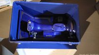 Blue Singer Featherweight sewing machine inside blue plastic case base