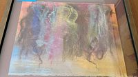 Full view of framed mixed media artwork with colored fibers on painted background.