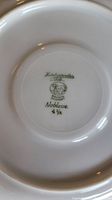 Close-up photo of the back stamp showing the Hutschenreuther logo, Noblesse pattern, and 4 1/2" size mark.