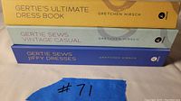 Stack of three Gertie Sews sewing books with colored spines showing titles and author.