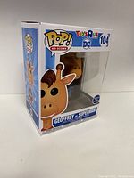 Front view of Geoffrey as Superman figure in original box showing character and logos.