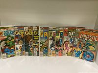 Front view of the lot of 11 Marvel's Greatest Comics starring Fantastic Four, displayed upright showing cover art and condition.