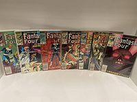 Seven Marvel Fantastic Four comic books displayed side by side showing covers from issues 260 to 268 (excluding 264 and 266)