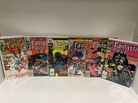 Six Marvel Comics Fantastic Four comic books from the early to mid-1980s, arranged side by side showing the front covers for issues 250, 254, 255, 256, 257, and 259. Covers include various characters and story titles such as 'Doomsday'.