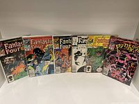 Front view of seven Marvel Fantastic Four comic books in protective sleeves showing issue covers 270, 271, 276, 277, 278, and 279.