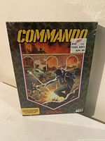 Front view of the sealed Atari 2600 Commando game box with original Zellers price tag showing $24.80.