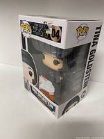 Front and side view of unopened Funko Pop! figure packaging showing the Tina Goldstein figure from Fantastic Beasts, number 04 in the series.