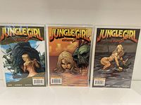 Three Jungle Girl Season 2 comic books with different cover art lined up side by side.