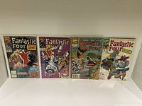 Front covers of Fantastic Four comic issues #342, #343, #346, #348 showing different artwork and characters including Spider-Man and the Fantastic Four team.