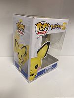View of Funko Pop! box side and front showing Pichu artwork and branding.
