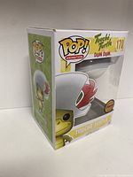 Front left angle of the boxed Touche Turtle POP! figure showing branding, character image, and figure inside box.