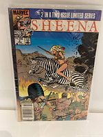 Full cover of Sheena Jungle Girl Comic Issue #2 showing Sheena riding a zebra with spear in hand, jungle setting in background.