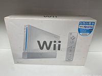 Front view of the Nintendo Wii retail box showing the console and Wii Remote, Wii Sports game included.