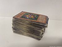 Stack of Yu-Gi-Oh cards showing wear and edges.
