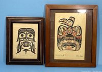 Two framed West Coast First Nations indigenous art prints, one by Bill Reid titled 'Children of the Raven', one by Roy Vickers.