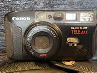 Front view of Canon Sure Shot TELEmax camera showing lens, flash, and controls.