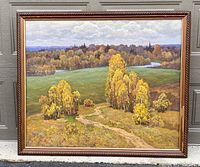 Full view of the framed oil painting showing an autumn landscape with yellow trees, green fields, and a winding path.