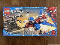 Front of sealed LEGO box showing Spiderjet and Venom Mech with 371 pieces and Marvel Spider-Man branding.
