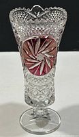 Front view of the vintage Bohemia crystal vase showing ruby floral design and cut crystal patterns.
